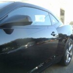 Photographs of a 2014 Chevrolet Camaro that was in an accident and repaired by Elite Paint & Body Shop in West Palm Beach Florida